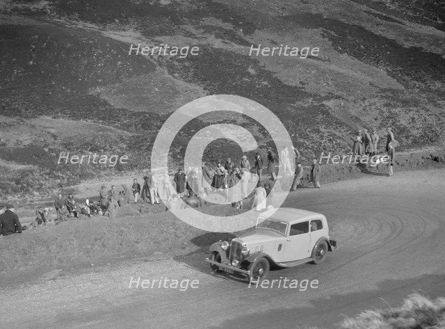 Austin 12/6 of JW Flewitt at the RSAC Scottish Rally, Devil's Elbow, Glenshee, 1934. Artist: Bill Brunell.