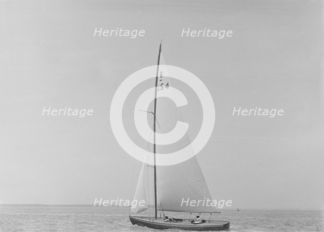 The 6 Metre class 'Sheila' (US4) sailing upwind, 1921. Creator: Kirk & Sons of Cowes.