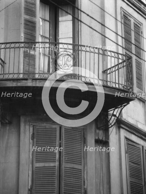 Pedesclaux-Lemonnier House, 640 Royal Street, New Orleans, between 1920 and 1926. Creator: Arnold Genthe.