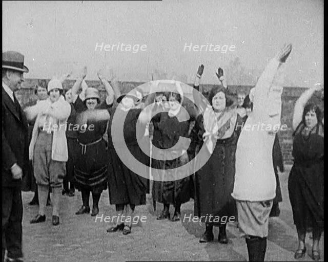 A Group of Plus Size Female Civilians Exercising on a Beach, 1920. Creator: British Pathe Ltd.