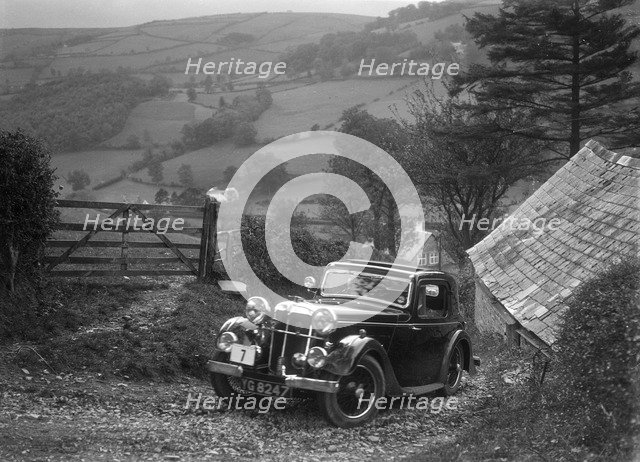 1934 Standard Avon Ten coupe taking part in a Standard Car Owners Club trial. Artist: Bill Brunell.