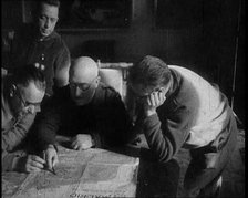 Four Men Consulting a Map in an Office, 1937. Creator: British Pathe Ltd.