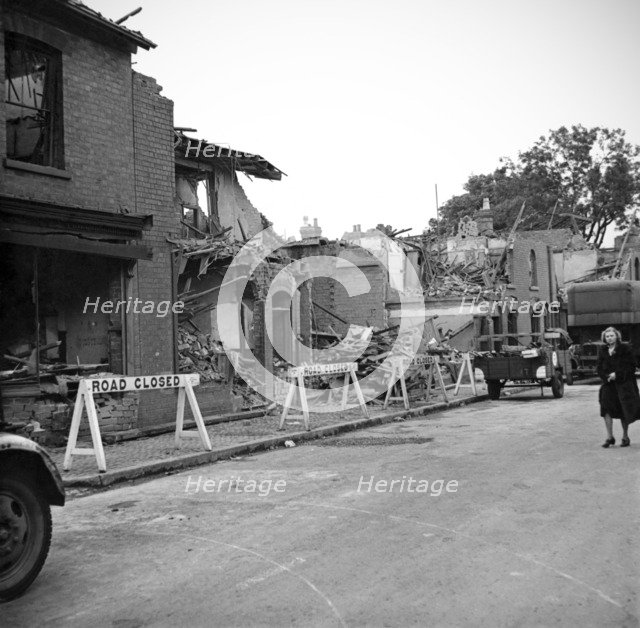 Wartime bomb damage, Highgate Road, Sparkbrook, Birmingham, West Midlands, 29 July 1942. Artist: James Nelson.