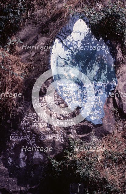 Tibetan script painted on rocks, Dharamsala, India, 1988. Creator: Amanda Waite.