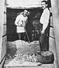 Howard Carter at the entrance to Tutankhamun's tomb, Luxor, Egypt, 1922-1923. Artist: Unknown