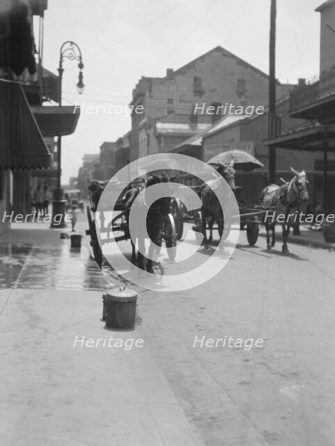 View down a street, New Orleans or Charleston, South Carolina, between 1920 and 1926. Creator: Arnold Genthe.