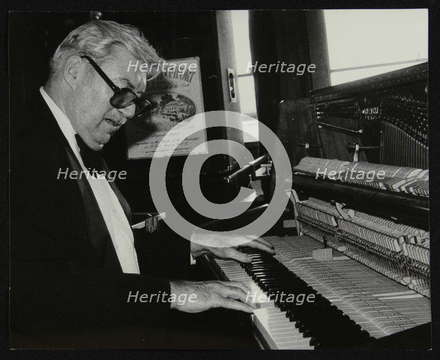 Nat Pierce at the piano, London, 1984. Artist: Denis Williams