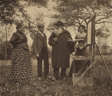 Camille Pissarro, Julie, Jeanne and Ludovic-Rodo at an easel in the orchard, c1890s. Creator: Unknown.