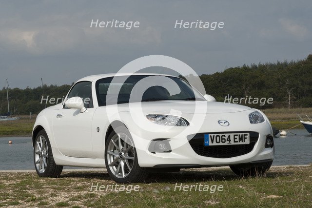 2014 Mazda MX5 Roadster Coupe Artist: Unknown.