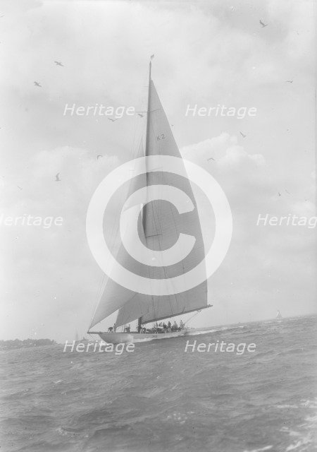 The 23-metre cutter 'Astra' sailing close-hauled, 1933. Creator: Kirk & Sons of Cowes.