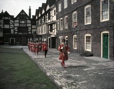 Yeomen Warders, Easter Sunday Parade led by the chief warder, Tower of London, 1954.   Creator: Arthur Charles Kirby Ware.