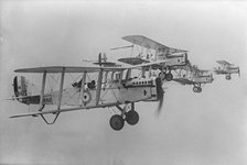 De Havilland DH9 aeroplanes flying in formation, 1923. Artist: Aerofilms.