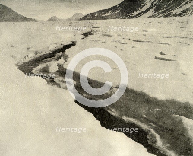 'Stream of Running Water in the Middle of the Ferrar Glacier in Midsummer', c1908, (1909).  Artist: Unknown.