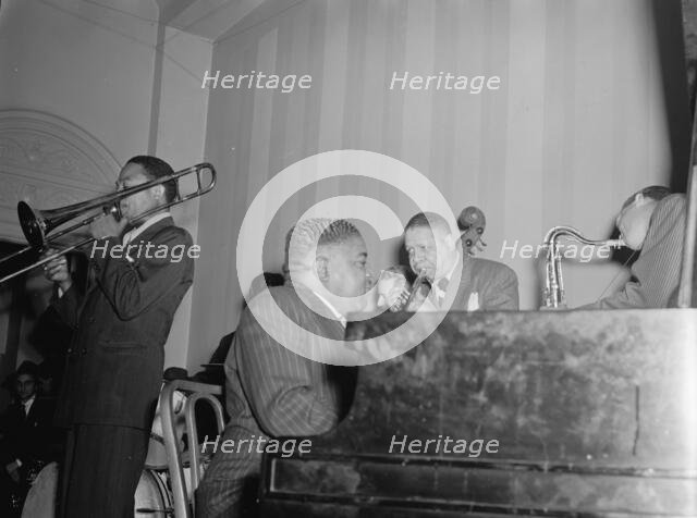 Portrait of Jay Higginbotham, Pete Johnson, Henry Allen, and Lester Young... Washington, D.C., c1940 Creator: William Paul Gottlieb.