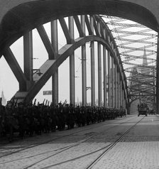 British troops crossing the bridge over the Rhine, Cologne, Germany, 1918-1926.Artist: Realistic Travels Publishers