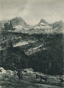 View of the Brenta Group with alpine pasture, Madonna di Campiglio, Dolomites, Italy, 1927. Artist: Eugen Poppel.