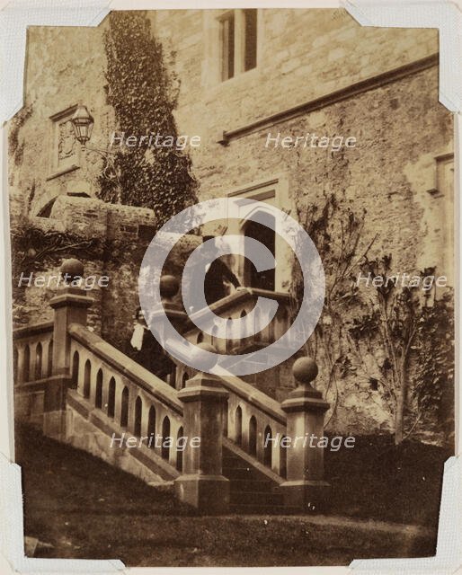 Man and Woman Standing on Exterior Stairs, c1870. Creator: Francis Edmund Currey.
