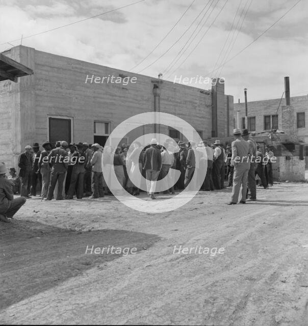 Waiting for the relief checks at Calipatria, California, 1937. Creator: Dorothea Lange.