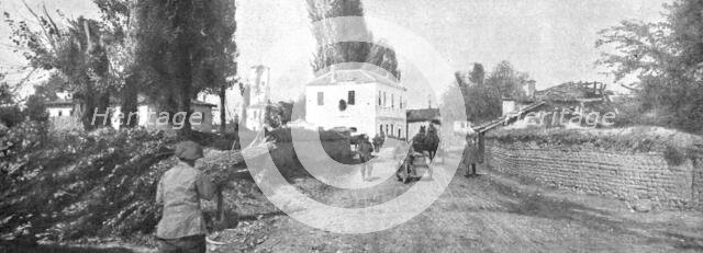 'Sur la route de Monastir; le village de Verbeni, qui fut sous le feu des deux artilleries..., 1916. Creator: Unknown.