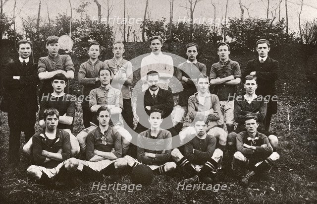 A group photo of a boy’s football team, 1911. Artist: Unknown