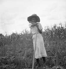 Negro girl working in the fields, Mississippi Delta, 1936. Creator: Dorothea Lange.