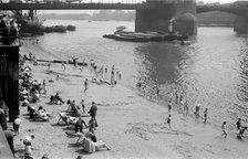 People relaxing on Tower Beach, London, c1945-c1955. Artist: SW Rawlings