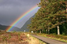 Rainbow over the road from Ullapool to Torridon, Highland, Scotland.