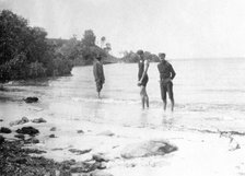 Men in swimming costumes at the water's edge, possibly at the mouth of the Tweed River, 1910. Creator: Robert Augustus Henry L'Estrange.