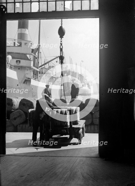 Bales being prepared for loading in London docks, c1945-c1965. Artist: SW Rawlings