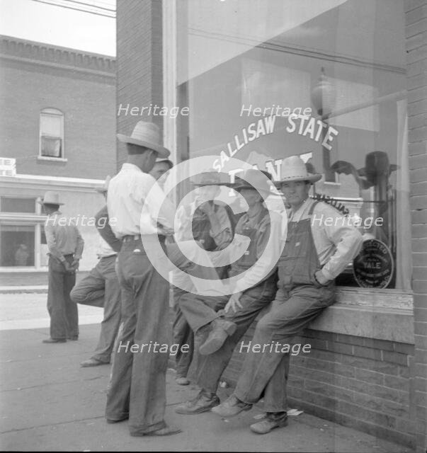 Farmers, Main street in Oklahoma town - Drought region, 1936. Creator: Dorothea Lange.