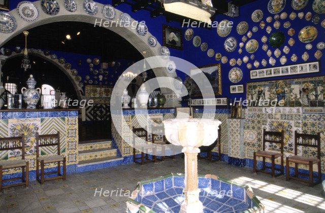 Inside of one of the rooms of the Cau Ferrat Museum in Sitges (Barcelona), with a fountain in for…