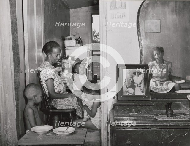 Mrs. Ella Watson, a government charwoman..., Washington, D.C., 1942. Creator: Gordon Parks.