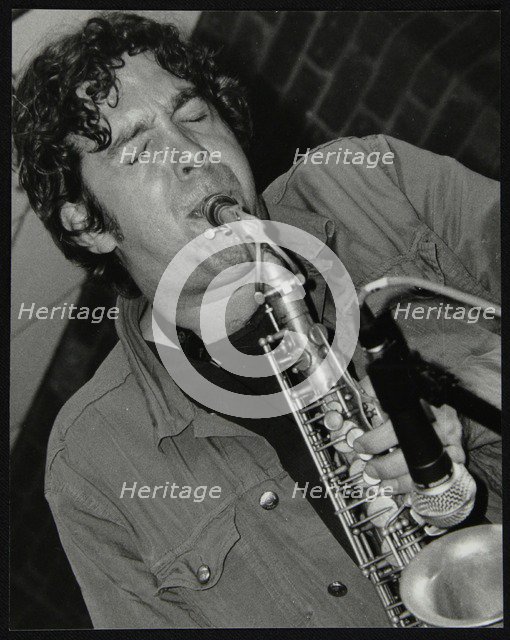 Alto saxophonist Christian Brewer playing at The Fairway, Welwyn Garden City, Hertfordshire, 2003. Artist: Denis Williams