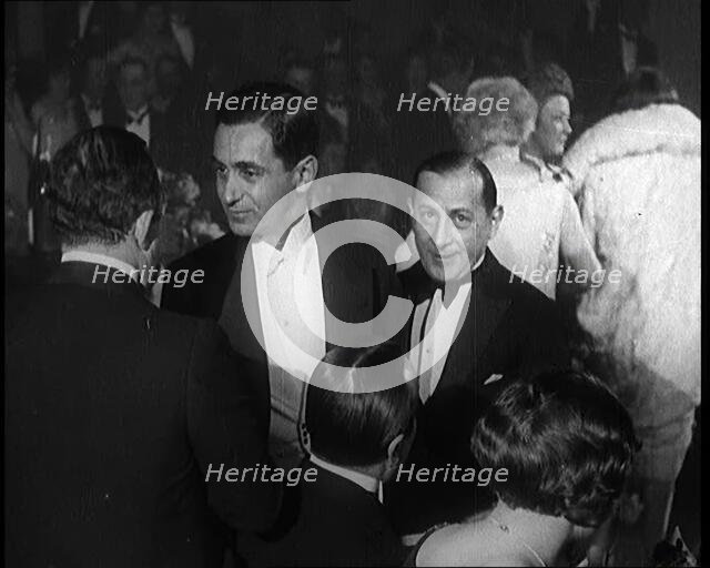 Composer Irving Berlin Talking to Two Male Civilians, 1924. Creator: British Pathe Ltd.