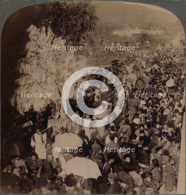 ''Shinto procession carrying sacred objects over bridge to Imperial Museum, Kyoto, Japan', 1904. Artist: Unknown.