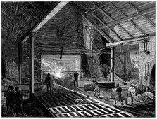 Tapping a blast furnace and running molten iron into the 'pigs', c1885. Artist: Unknown