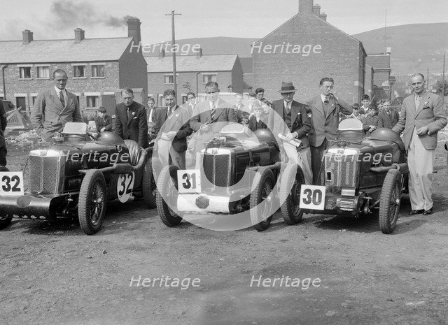 Three MG C type Midgets at the RAC TT Race, Ards Circuit, Belfast, 1932. Artist: Bill Brunell.