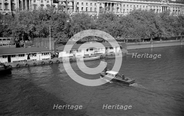 A police launch, Thames River Police station, Victoria Embankment, London, c1945-c1965. Artist: SW Rawlings