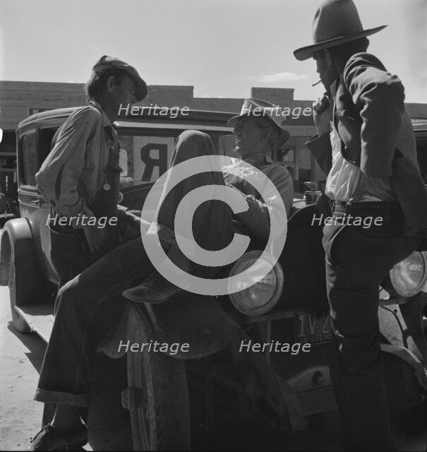 Drought refugees waiting for relief checks, Calipatria, California, 1937. Creator: Dorothea Lange.