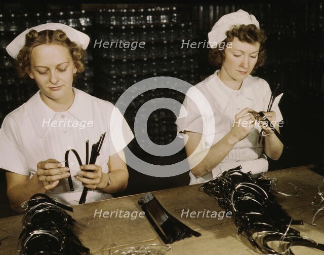 Two Navy wives, Eva Herzberg and Elve Burnham..., Glenview, Ill., 1942. Creator: Howard Hollem.
