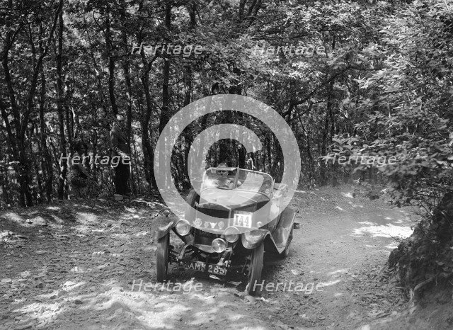 Windsor of CC Bliss competing in the B&HMC Brighton-Beer Trial, Fingle Bridge Hill, Devon, 1934. Artist: Bill Brunell.