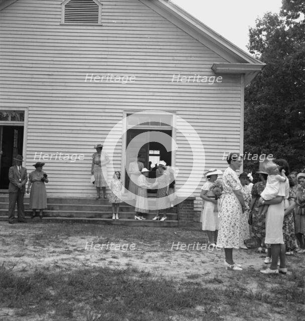 Congregation entering church, Wheeley's Church, Person County, North Carolina, 1939. Creator: Dorothea Lange.