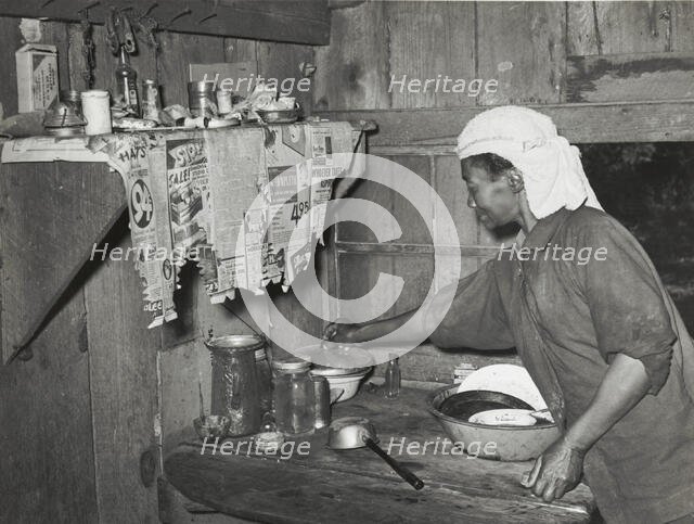 Negro tenant farmer who grew strawberries on shares near Hammond, Louisiana..., April 1939. Creators: Farm Security Administration, Russell Lee.