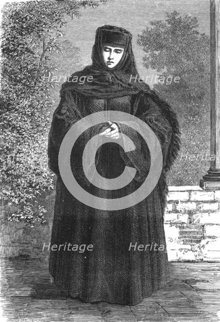 'Wallachian Lady in Travelling Costume; A Visit to the Danubian Principalities', 1875. Creator: Nelson Boyd.