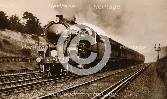 'The S.R. West of England Express Passing Earlsfield', early 20th century.  Creator: Unknown.