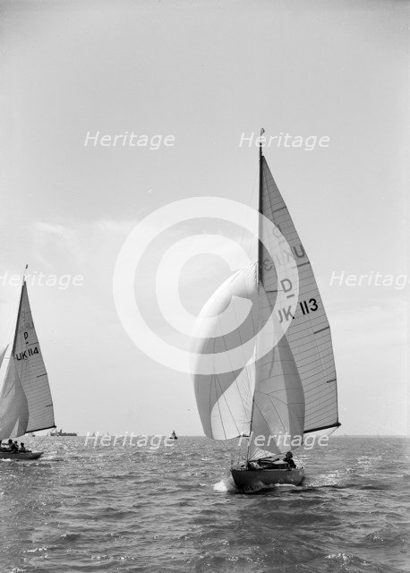 Sloop (Dragon? class) sailing with spinnaker, c1938. Creator: Kirk & Sons of Cowes.