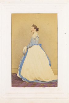 A man in drag standing side-on, [between 1890 and 1899?]. Creator: Unknown.