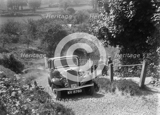 1934 Singer saloon taking part in a West Hants Light Car Club Trial, Ibberton Hill, Dorset, 1930s. Artist: Bill Brunell.
