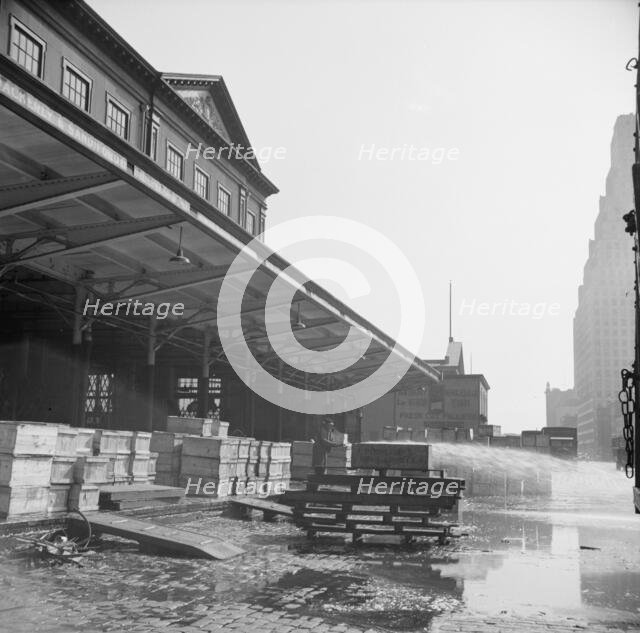 Late evening scene at the Fulton fish market, New York, 1943. Creator: Gordon Parks.