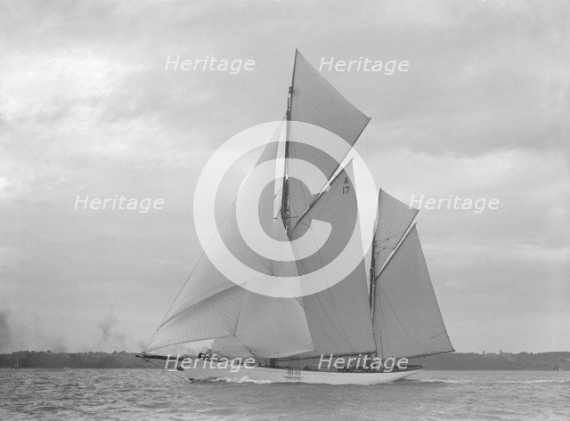 The 118 foot racing yacht 'Cariad', 1911. Creator: Kirk & Sons of Cowes.